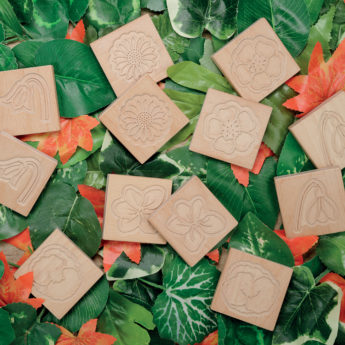 16 sustainably-sourced wooden flower tiles
