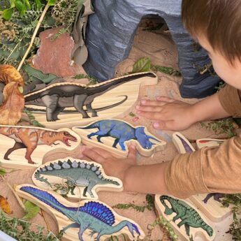 Set of eight dinosaur wooden characters